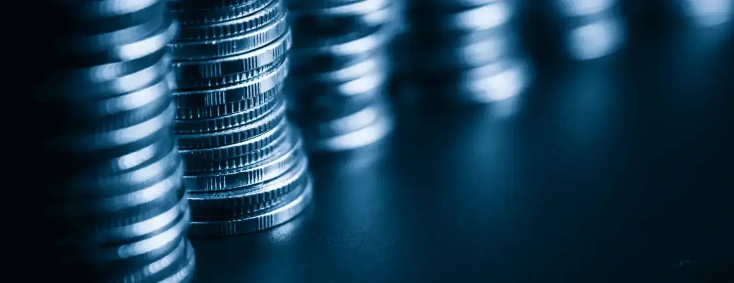 stacked coins symbolizing cost or pricing