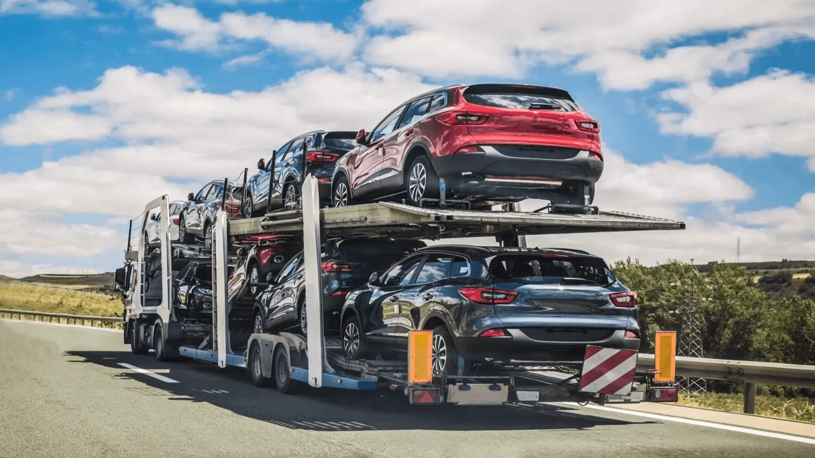  Car transporter moving on a ro