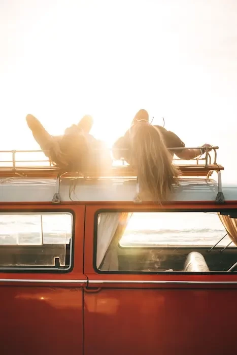  friends on car roof small