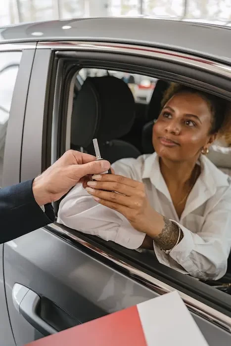  woman getting a car key small