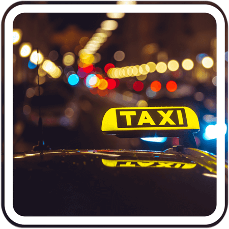 A picture of a sign with the word taxi