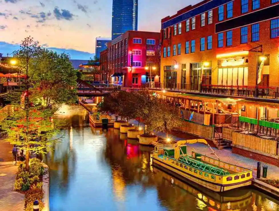  a canal lined with buildings and a boat