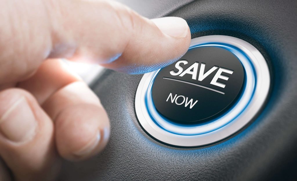 close-up of a finger pressing a button that says SAVE NOW in large white letters