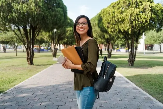 A woman smiling to the camera